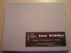 Low Bidder: a Game of Management Strategy